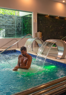 Man on hydrotherapy at El Cocay Spa